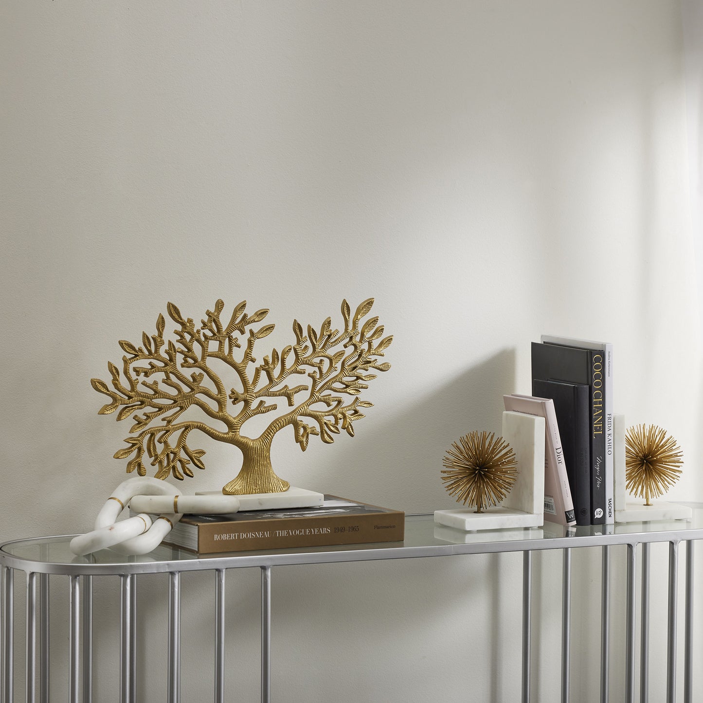 White marble linking chain sculpture with brass inlay| Haus of Bazar | Sydney