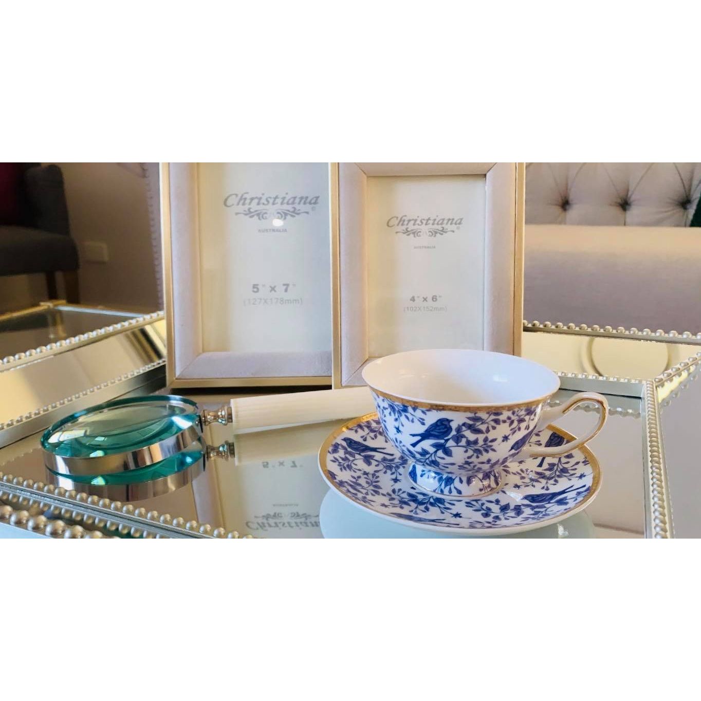 Blue And White Tea Cup And Saucer | Blue And White Tea Cup With Blue Bird Design | Blue And White Tea Cup With Gold Detailing | Blue And White Tea Cup Styled On Mirror Tray | Haus Of Bazar | Sydney